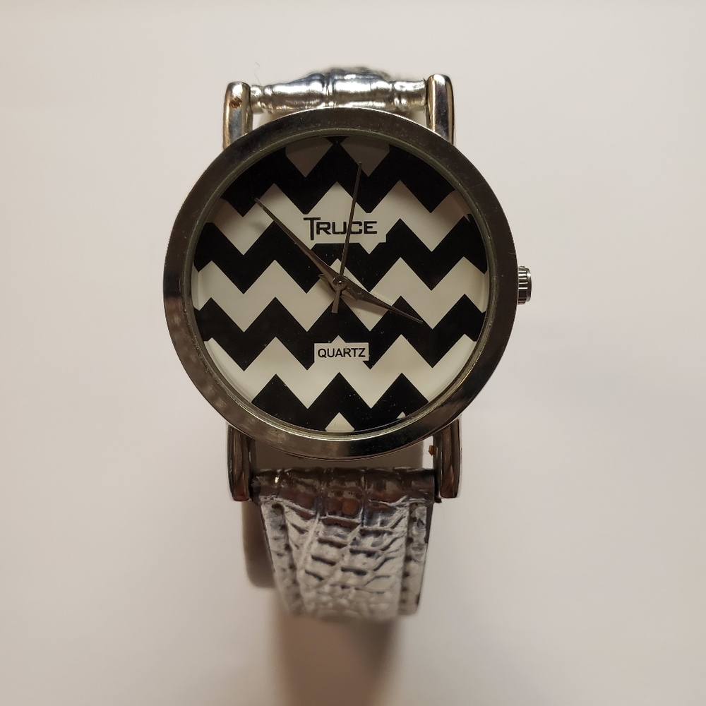 TRUCE Chevron Watch Black and White with Silver Leather Band.